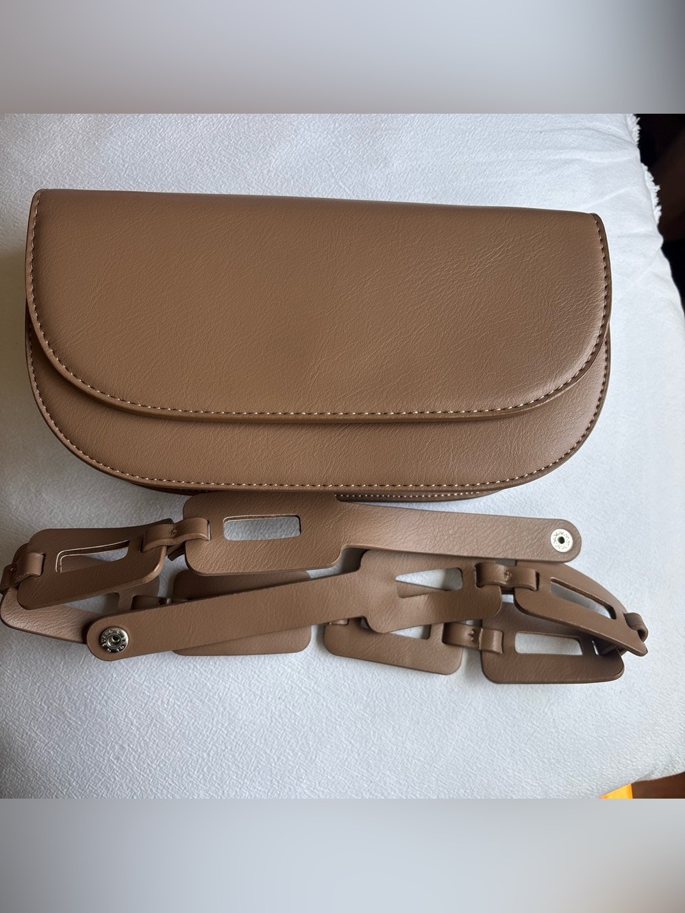 Tan Leather Crossbody Bag with Decorative Chain Strap